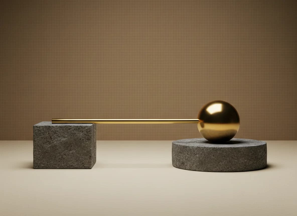 A brass rod reaching from a stone block to a brass sphere that rests on a wide low stone plinth